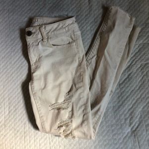 Cream Distressed jeans